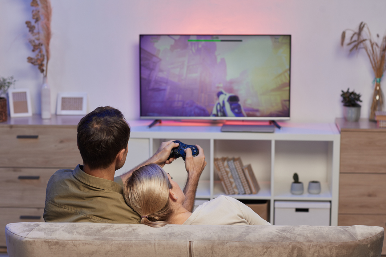 Couple gaming on an 8K Smart TV